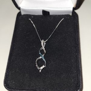 White, blue, and black diamond silver-toned necklace